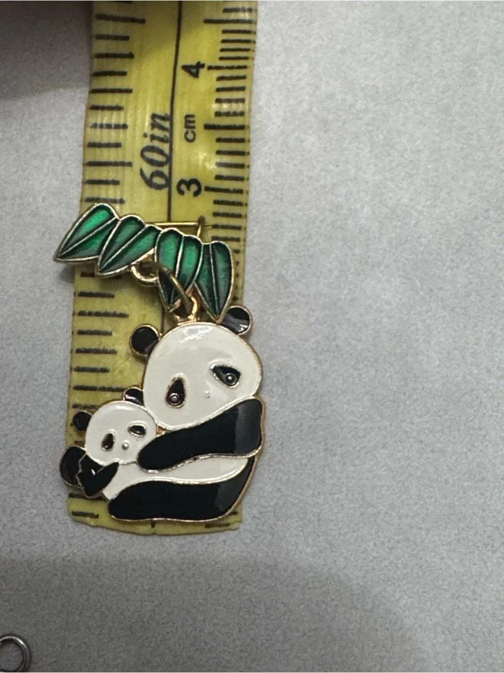 vintage gold-tone panda mom with baby enamel pin